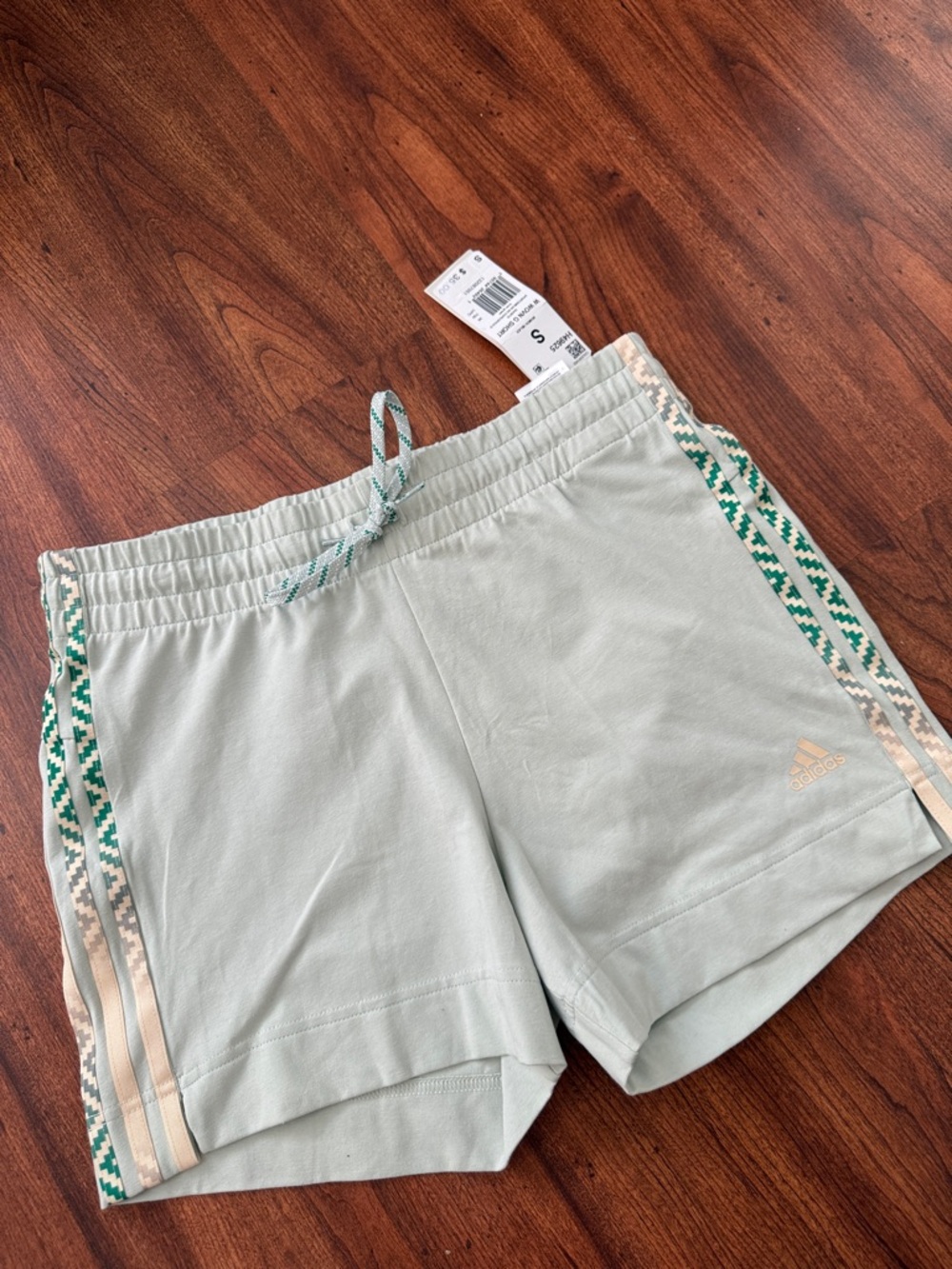 adidas Women's Sage Green Athletic Shorts with Patterned Side Stripes